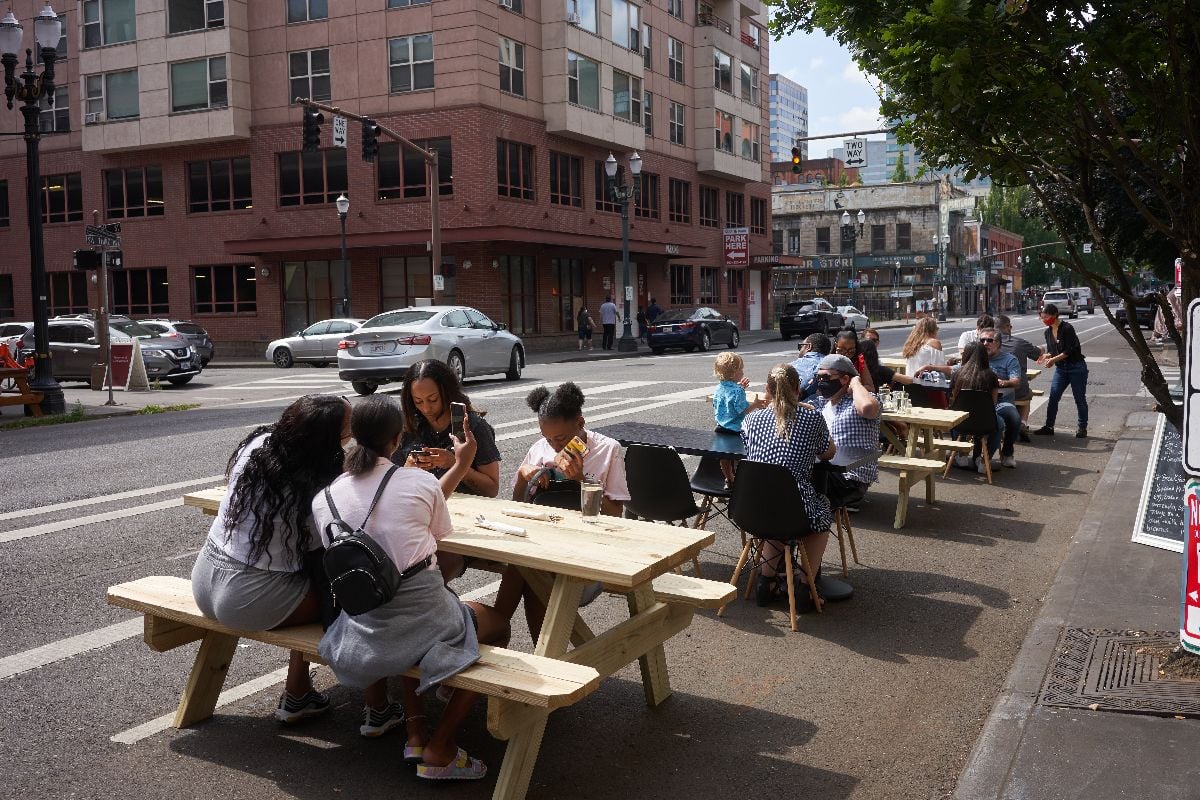 On-street outdoor dining on a Saturday morning.