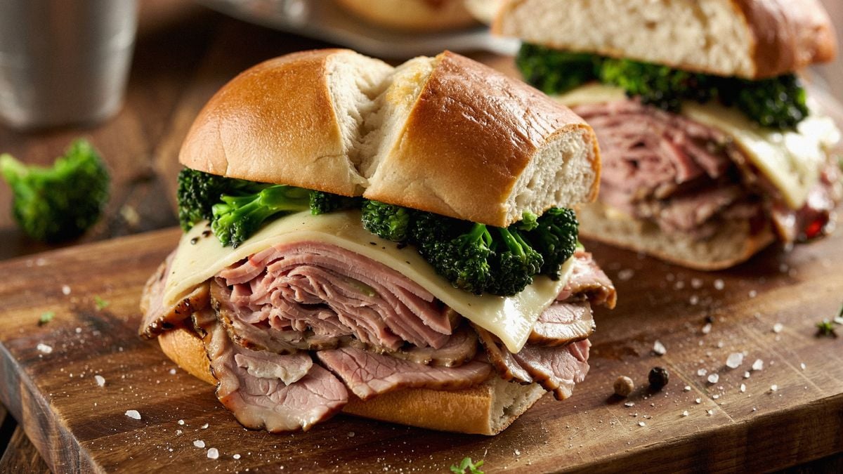 Juicy roasted pork layered with sharp provolone and sautéed broccoli rabe in a crusty roll.