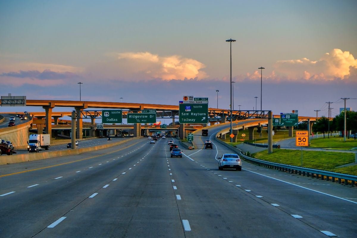 Route 75 South at the intersection with Sam Rayburn Tollway at sunset.