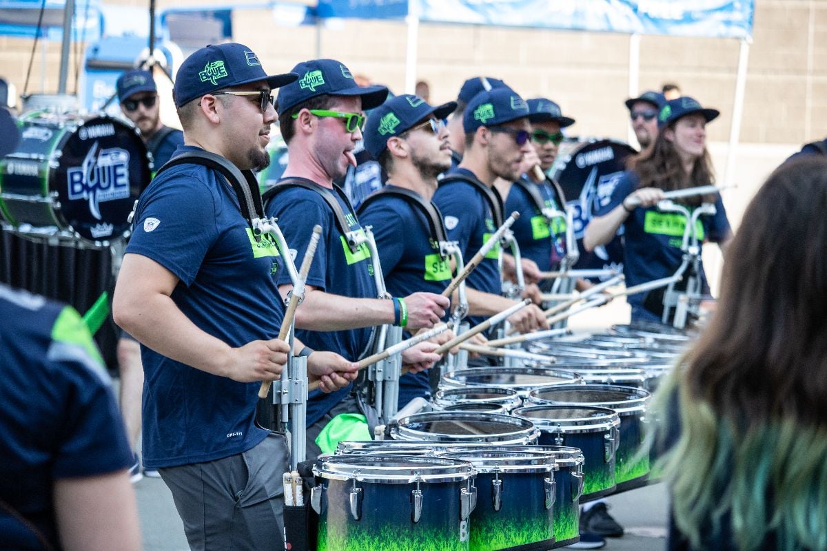The Blue Thunder drumline in front of CenturyLink Field before a Seattle Seahawks football game. 