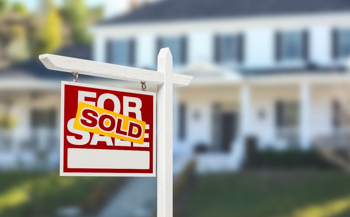 Sold sign on a for sale sign.
