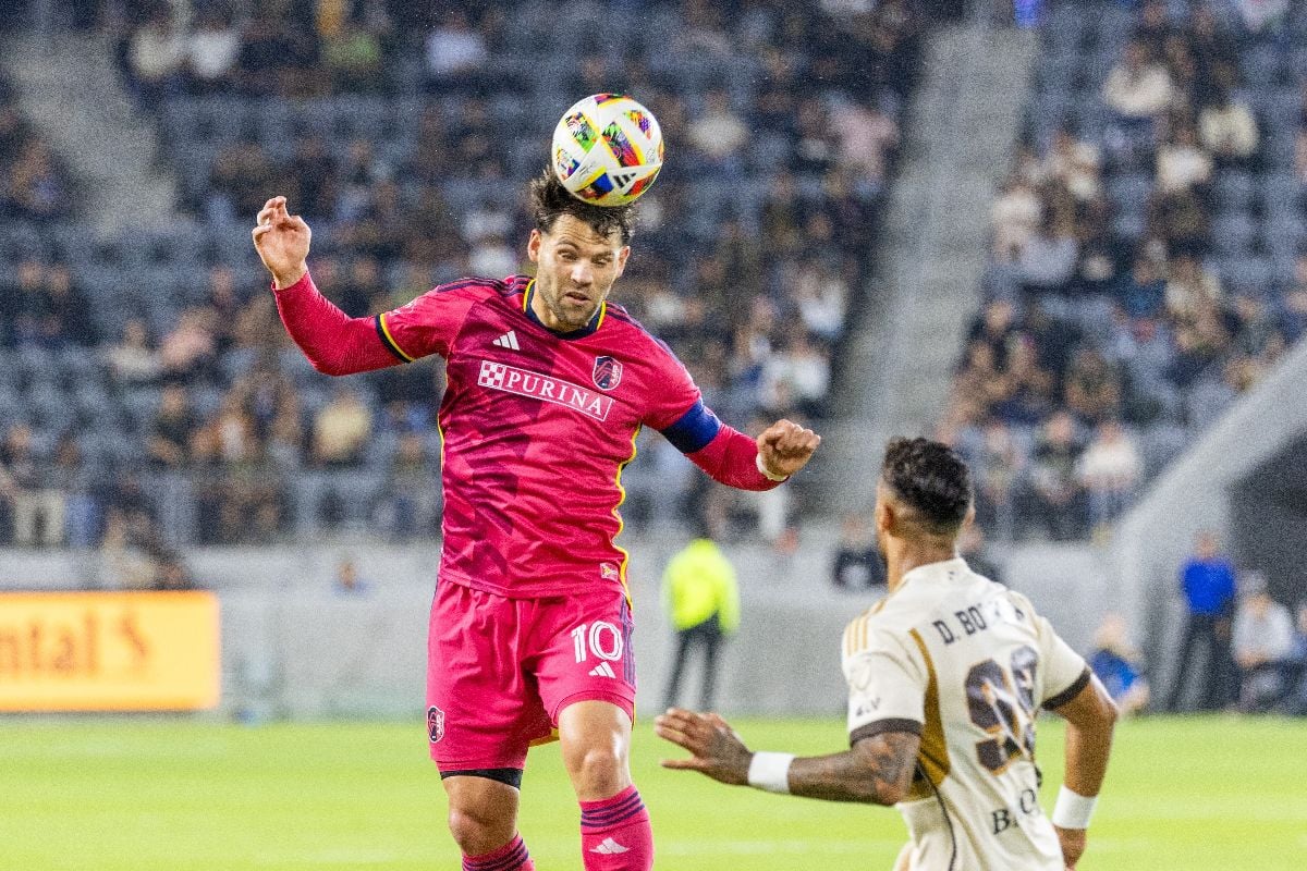 St. Louis City's Eduard Löwen #10 and Los Angeles FC's Dénis Bouanga #99 vie for the ball during an MLS soccer match.