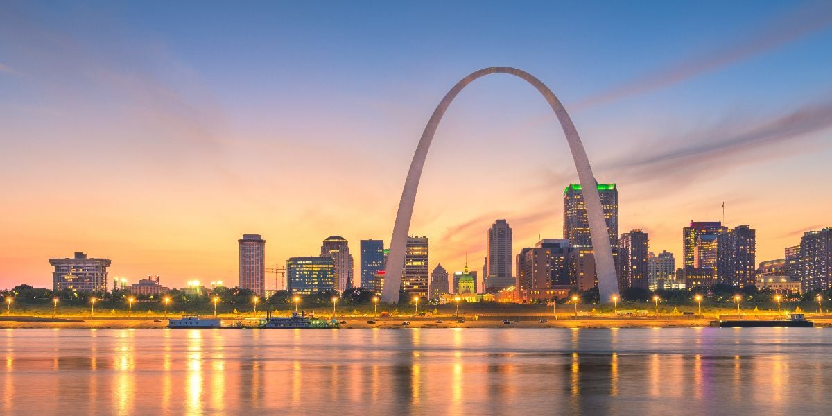 St. Louis downtown cityscape on the river at dusk.