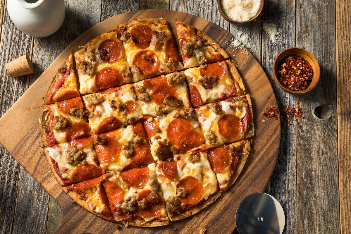 Homemade St Louis Style pepperoni pizza with cheese.