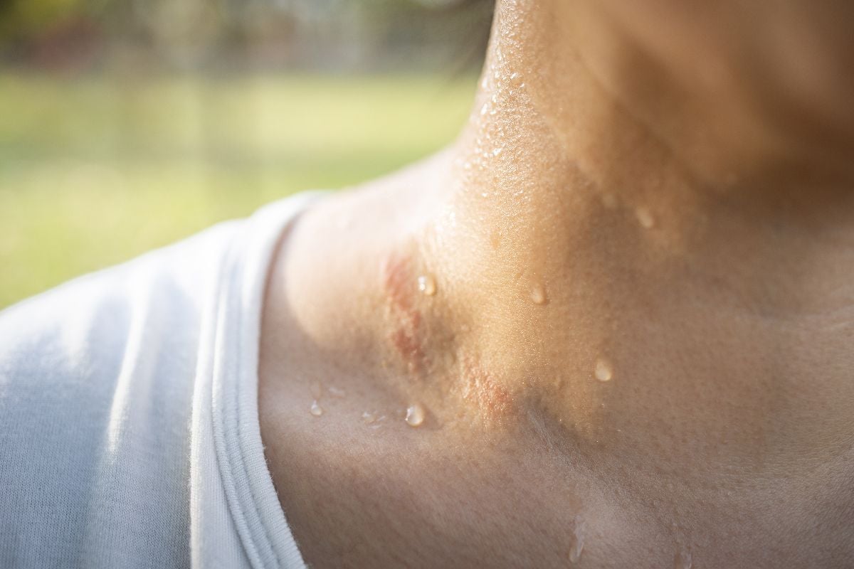 Closeup of a sweaty woman.