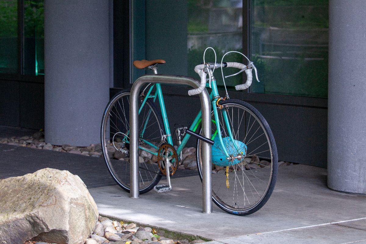 Parked old bicycle in residential building.