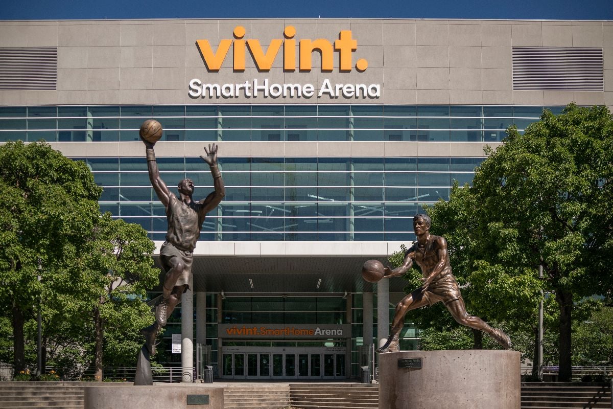 Vivint Smart Home Arena with NBA Utah Jazz basketball statues.