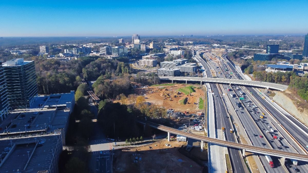 Rapid transit line rail system, elevated expressway along Perimeter Interstate 285 highway construction site.