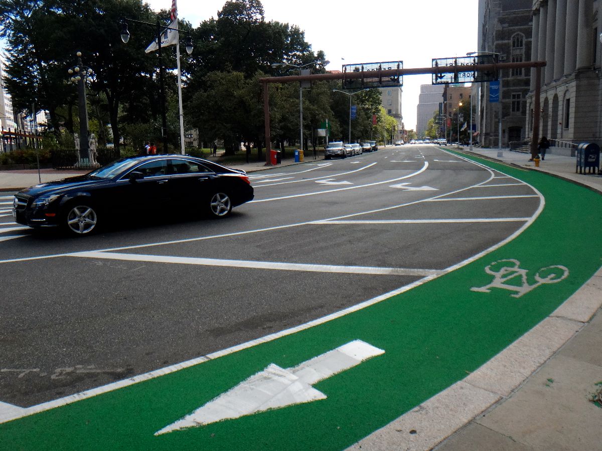 Streetscape of Washington Street with a bicycle lane.