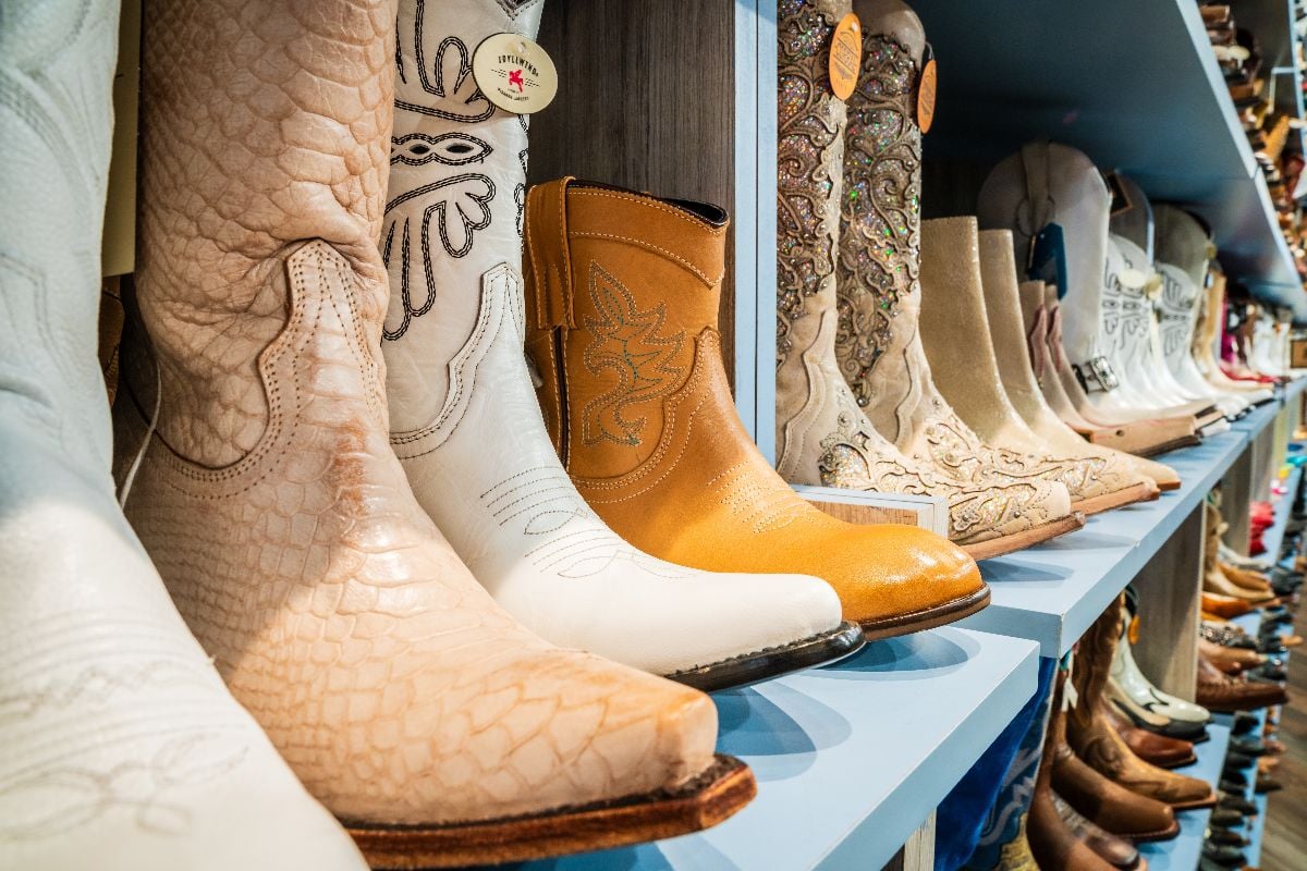 Western style boots on the shelves of the specialty boot shop in downtown Nashville.
