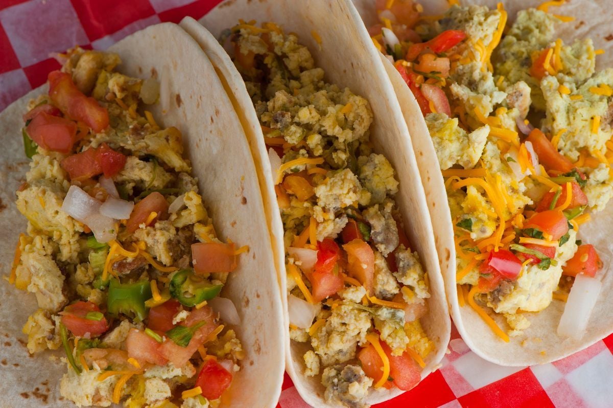 Crispy flour and corn tortillas filled with eggs, sausage, bacon, beef, cheese, sour cream, salsa and guacamole.