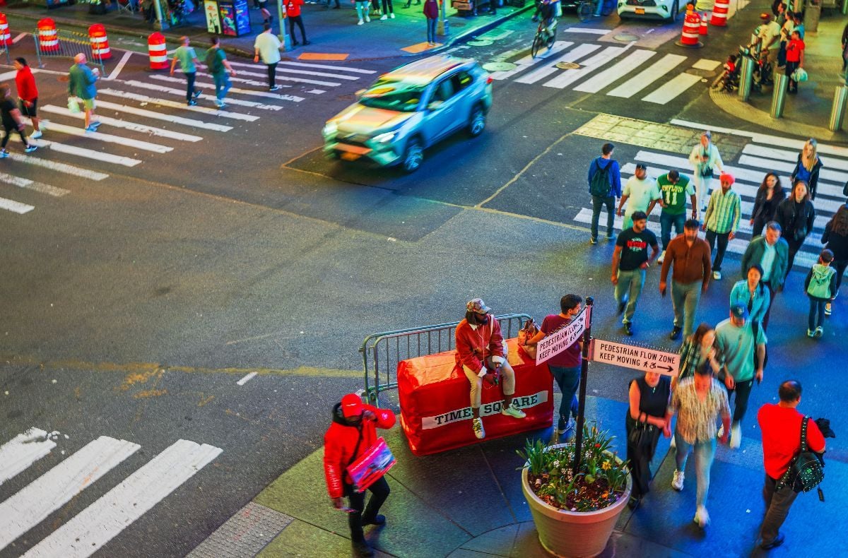 Top view from red stairs of Broadway's crossroad at night.