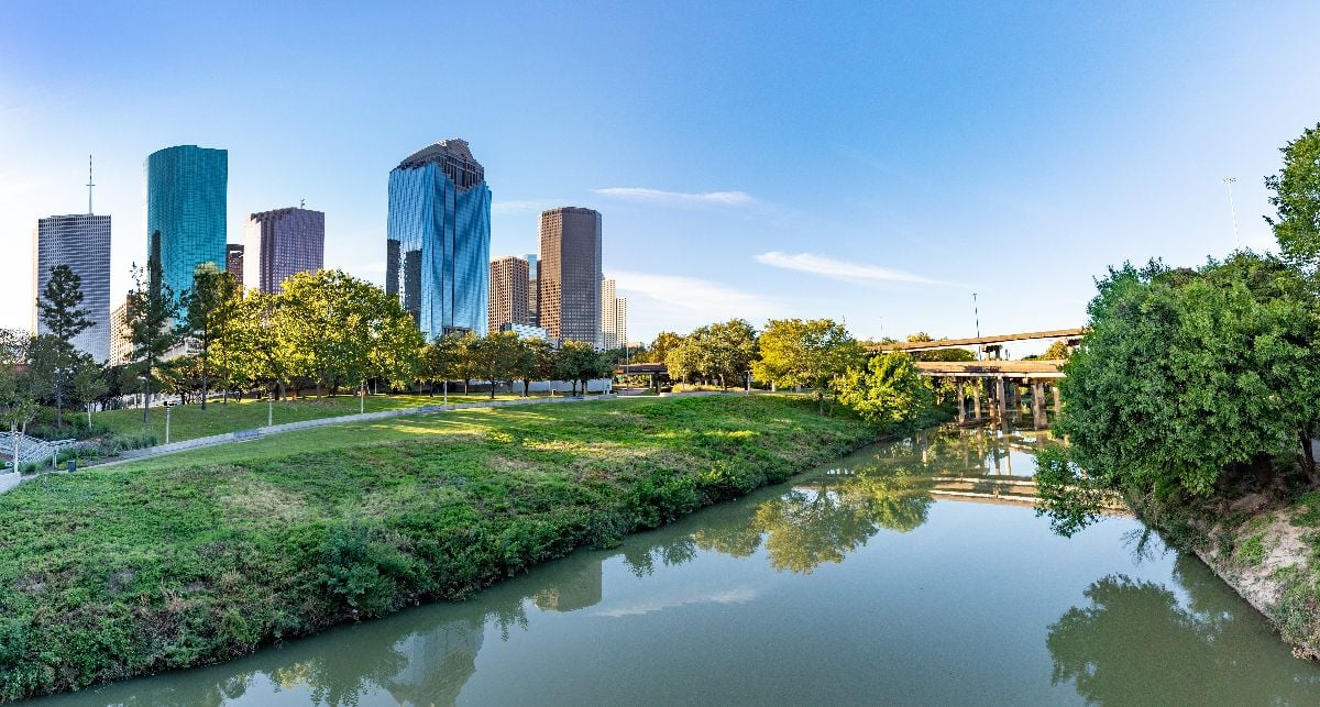Scenic skyline of Houston, Texas in morning light seen from Buffalo Bayou Park.