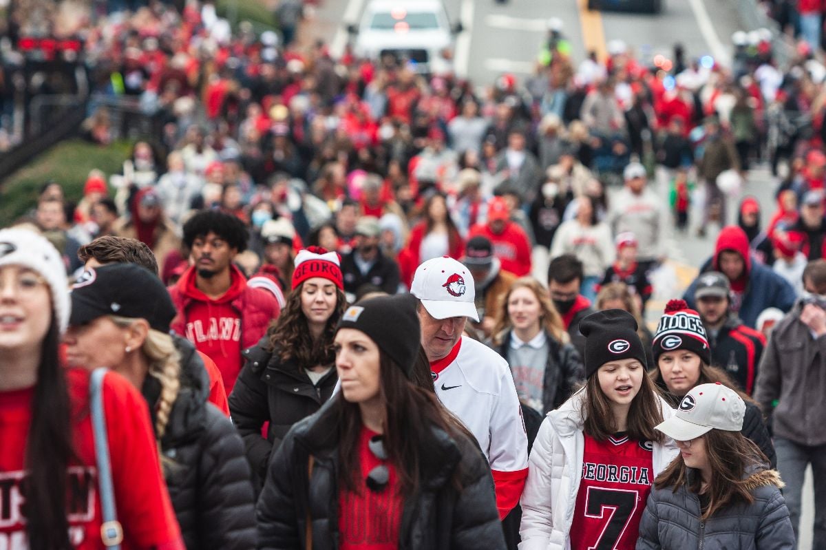 Thousands of UGA fans gather on Lumpkin Street at Georgia's football National Championship victory parade.