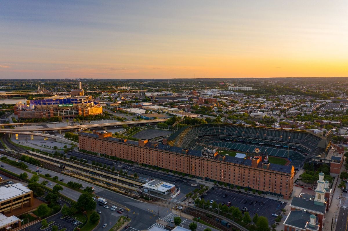 Sports stadiums in downtown baltimore at dusk.