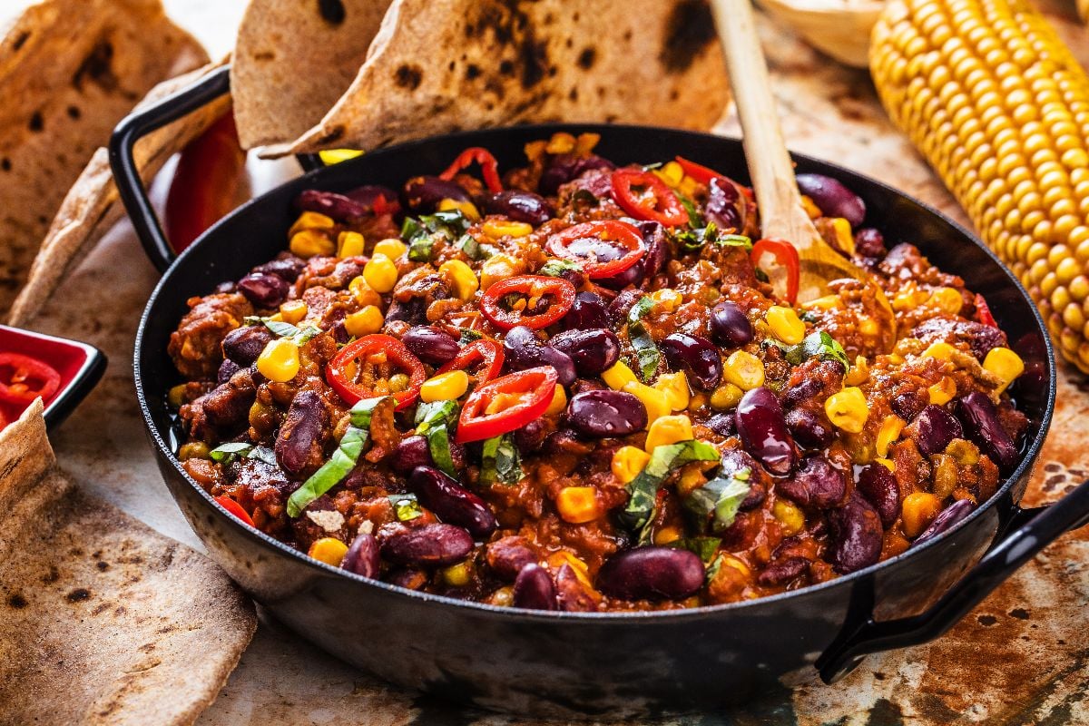 Chili con carne in a clay bowl.