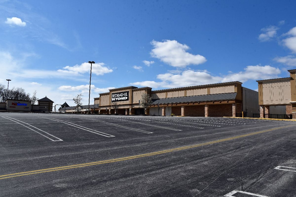 Closed store and empty parking lot on a Sunday.