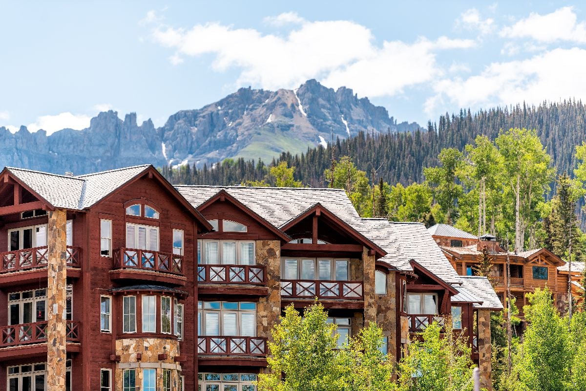 San Juan Mountains and modern resort lodge apartment condo