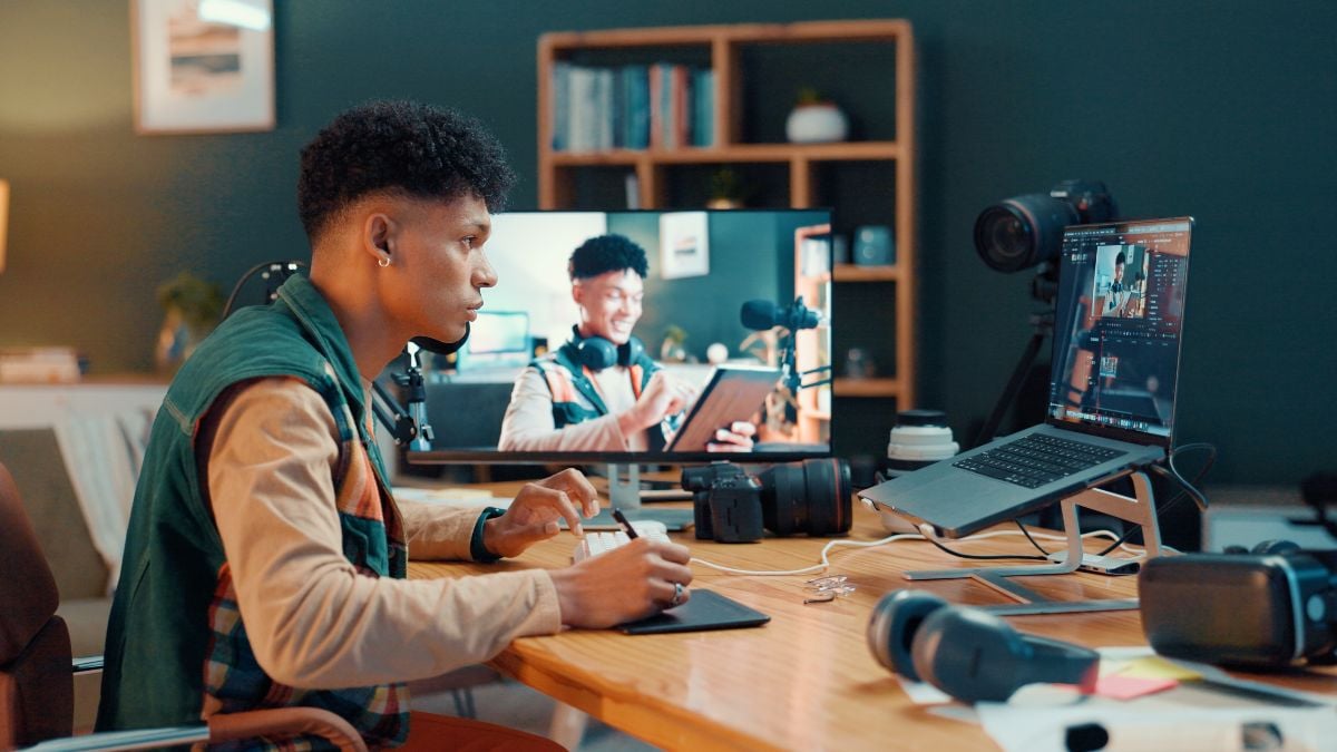 Content creator working on his desk.