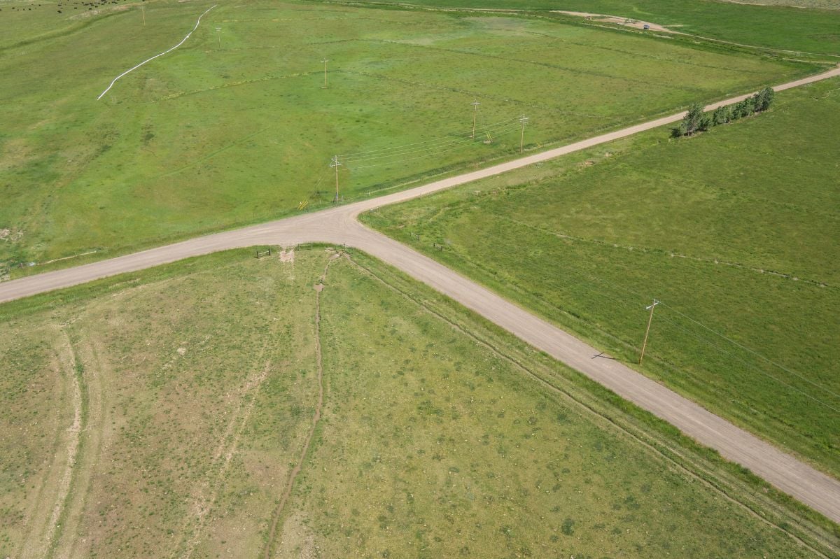 Empty farm dirt road intersection