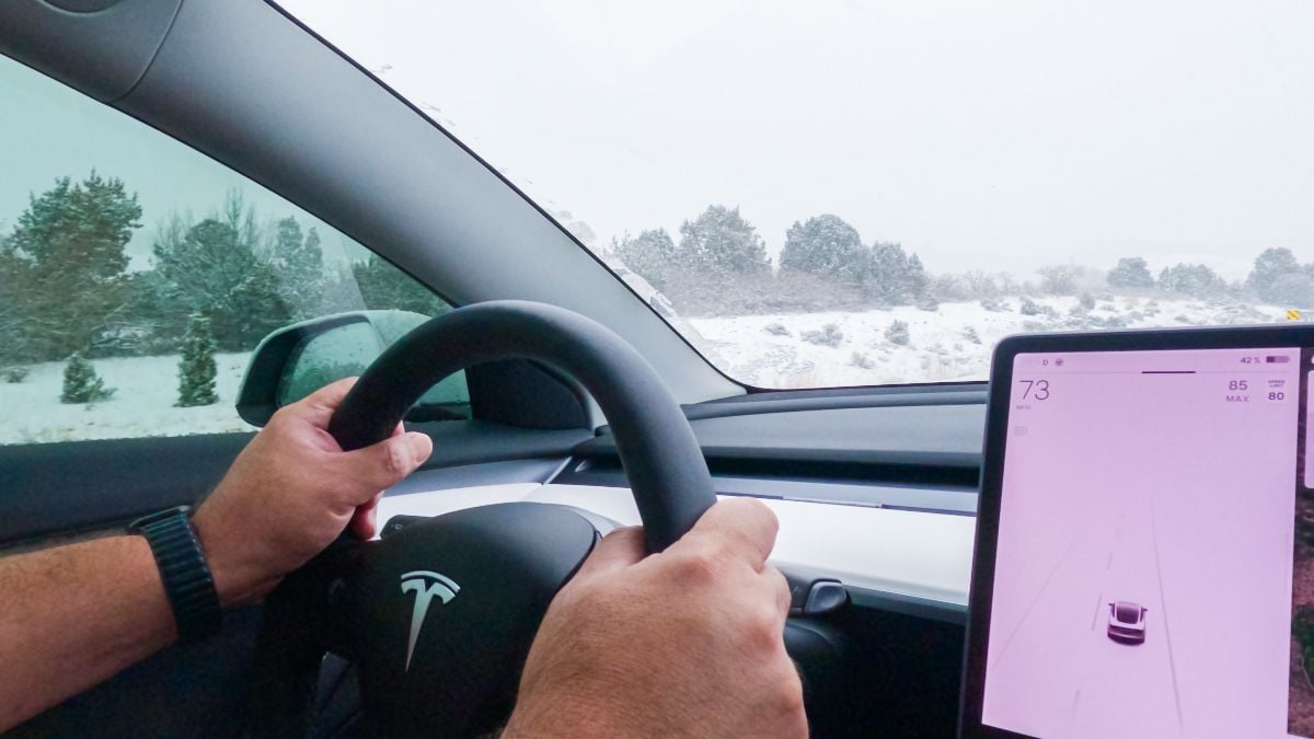 Driver navigates through Western Colorado's snowy landscapes during a winter storm.