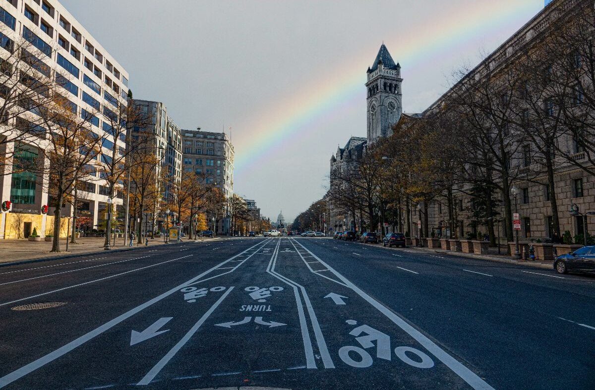 Rainbow over empty and quiet Pennsylvania Avenue. 