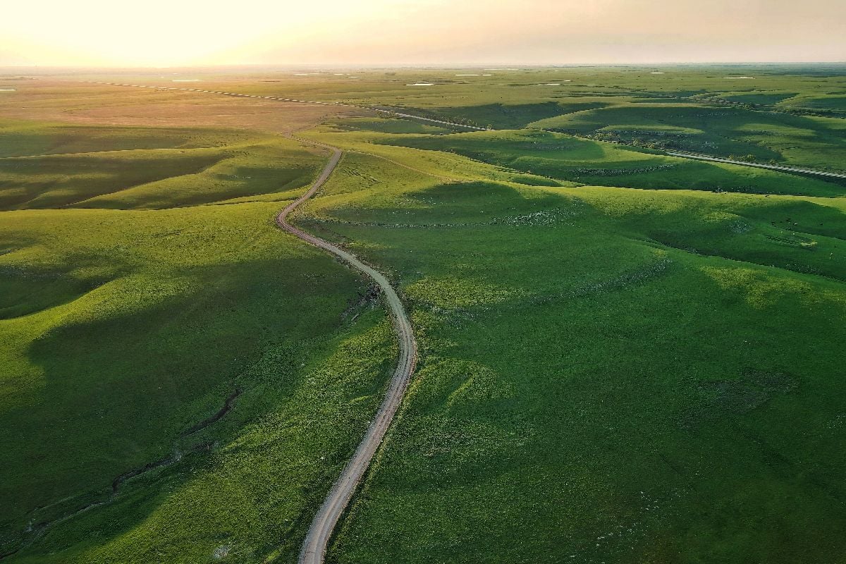 Green Flint Hills of Kansas from the air at sunset.