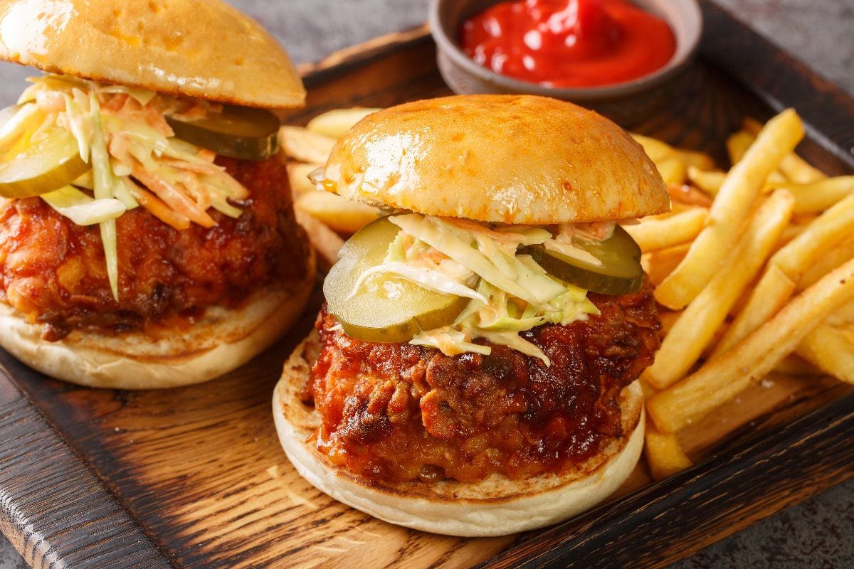 Spicy southern style fried chicken sandwich with coleslaw and pickles.