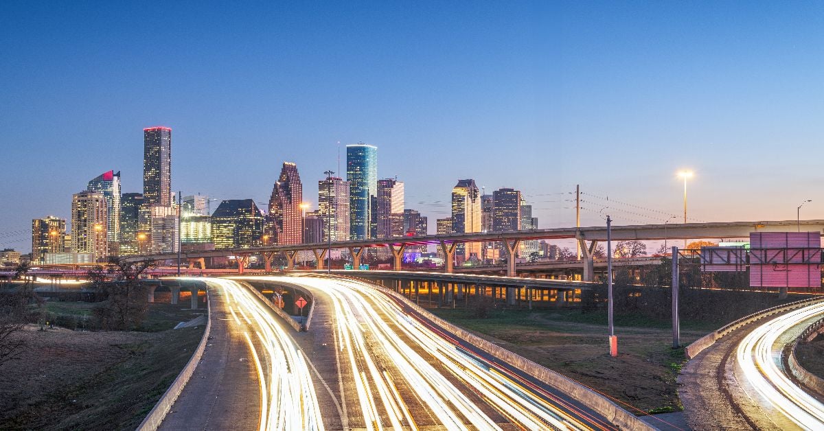 Houston downtown skyline over the highways at dusk.