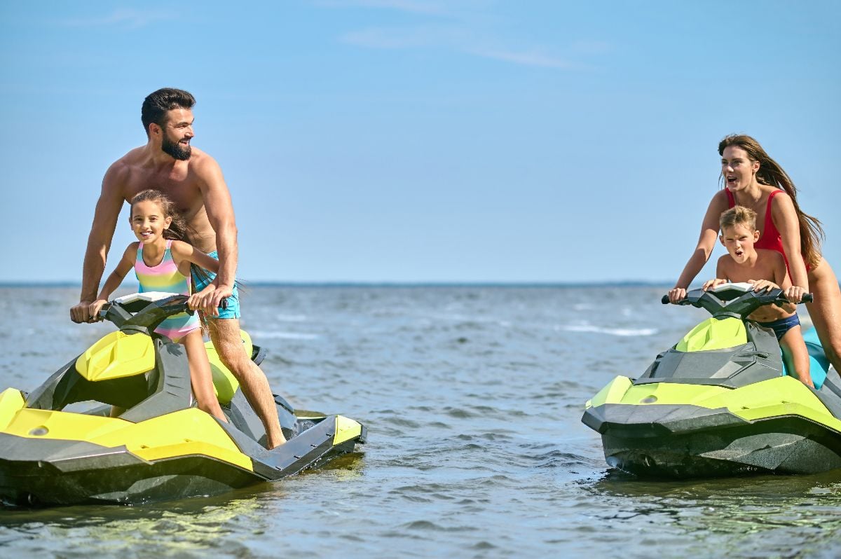 Family enjoyed jet-skiing on the water.