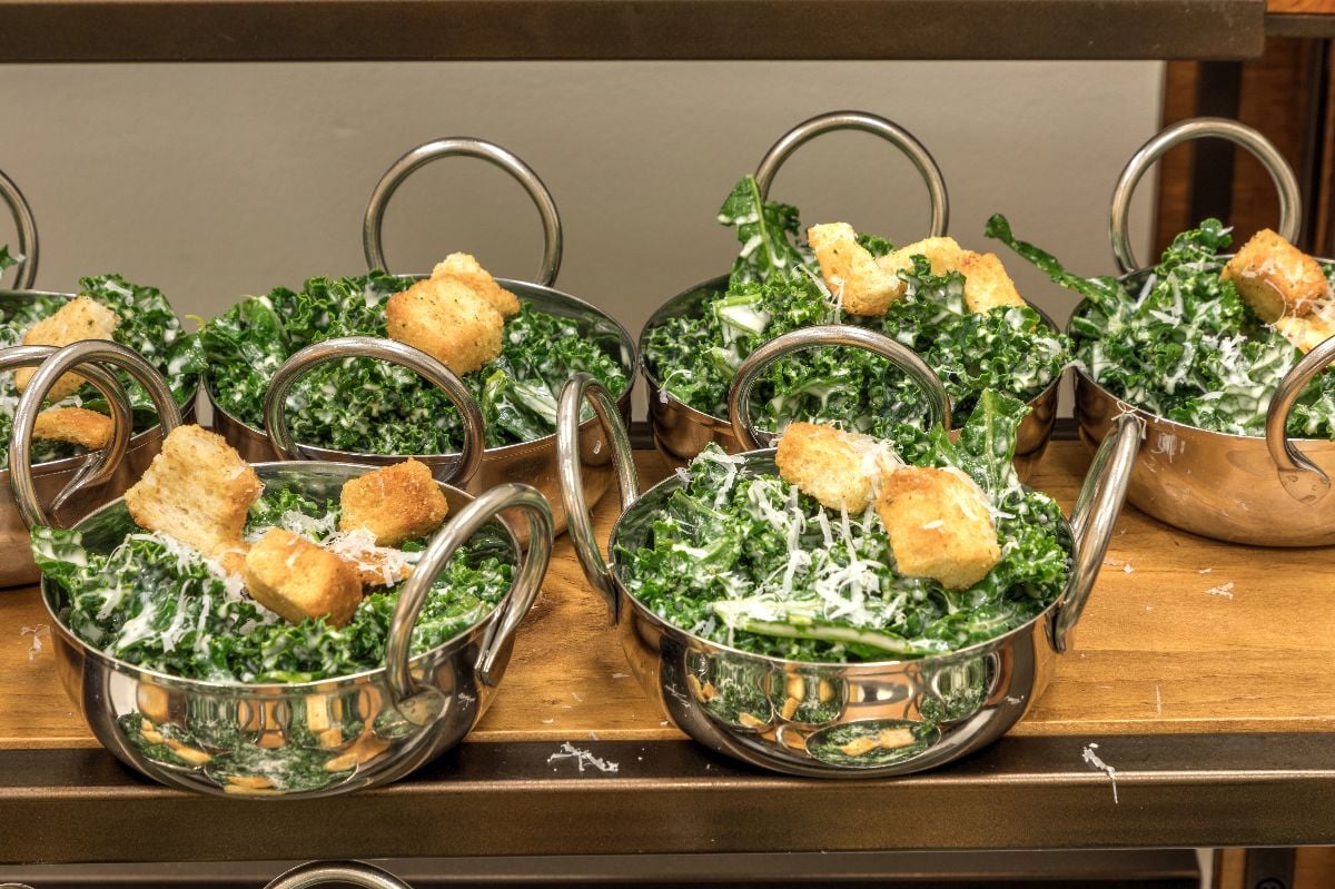 Kale caesar with croutons salad.