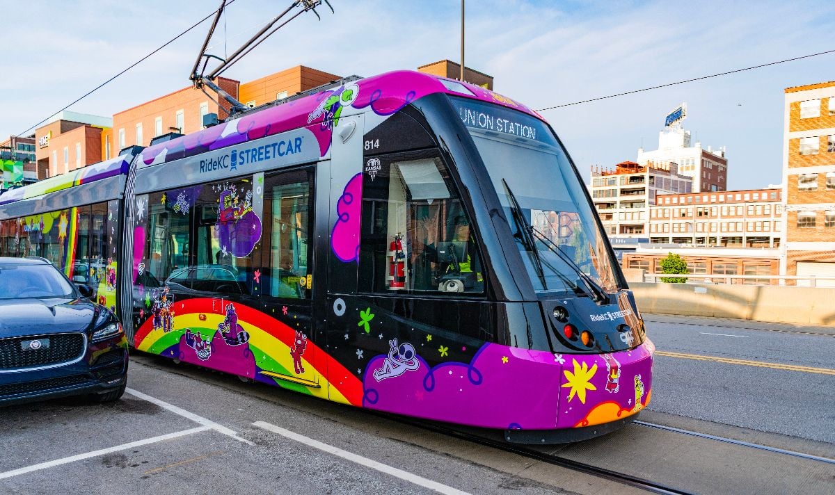 Urban street with public transport including a streetcar.