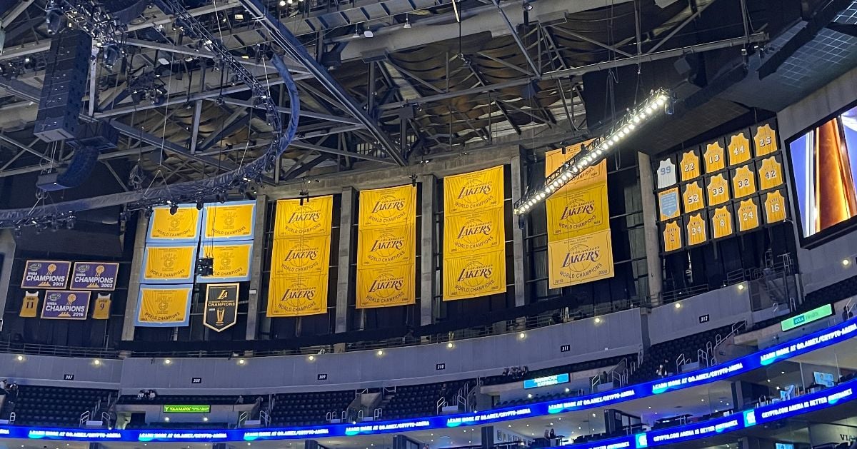Championship banners from Minneapolis and Los Angeles & retired jerseys, hanging in the rafters of Crypto.com Arena in 2024.