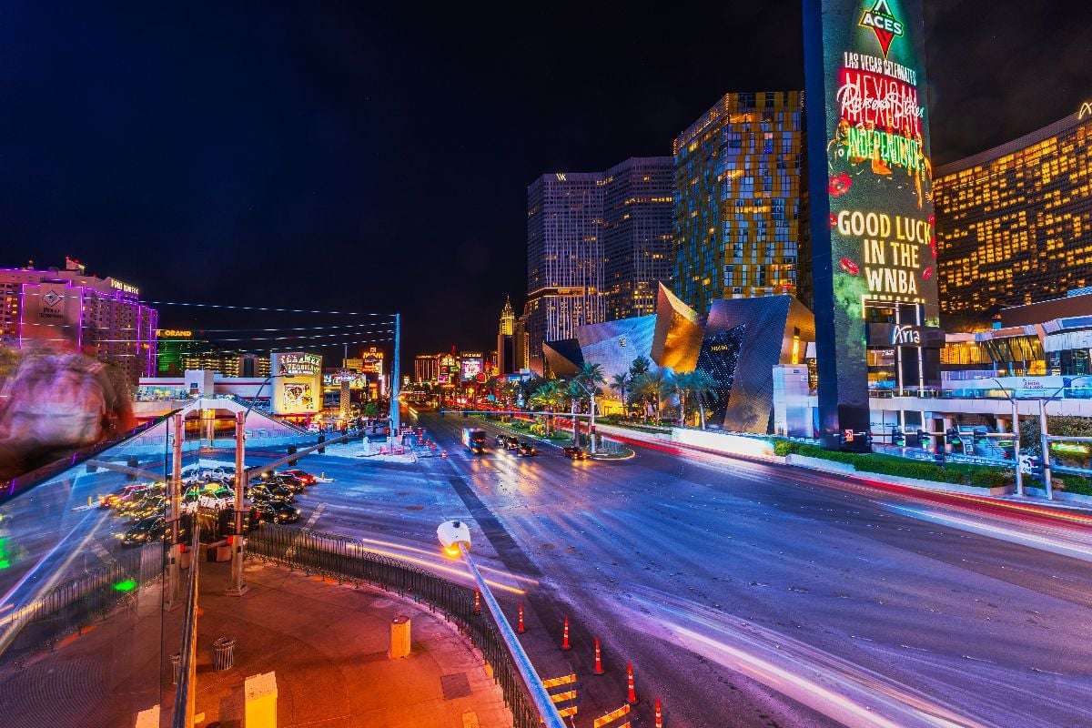 Colorful light trails from cars on Las Vegas Strip at night.