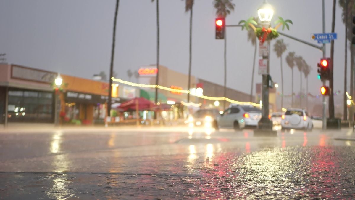 Lights reflection on road in rainy weather.