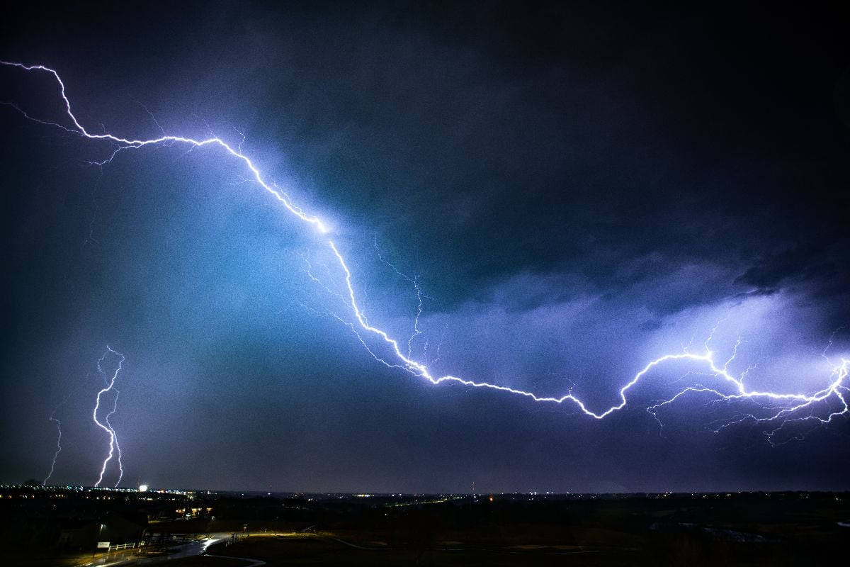 Lightning storm over a small city.