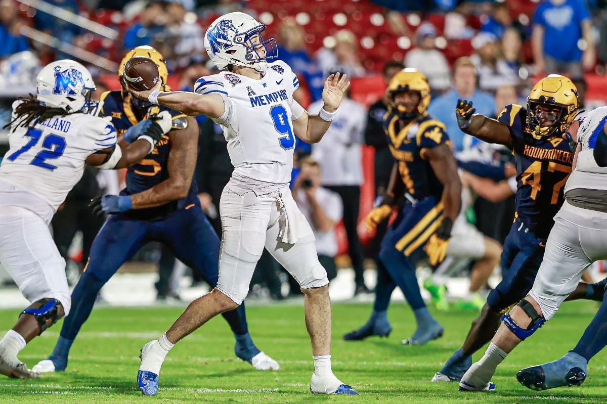 Scooter's Coffee Frisco Bowl football game between the Memphis Tigers and West Virginia Mountaineers.