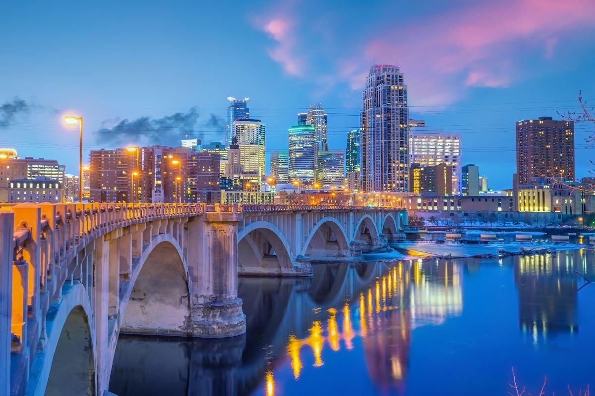 Cityscape of Minneapolis downtown skyline in Minnesota at sunset.