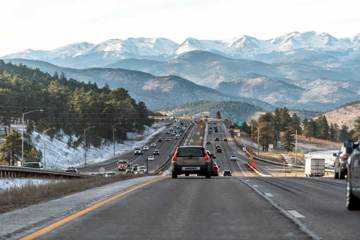 Colorado interstate i70 road in Denver Golden with exit sign and traffic jam.