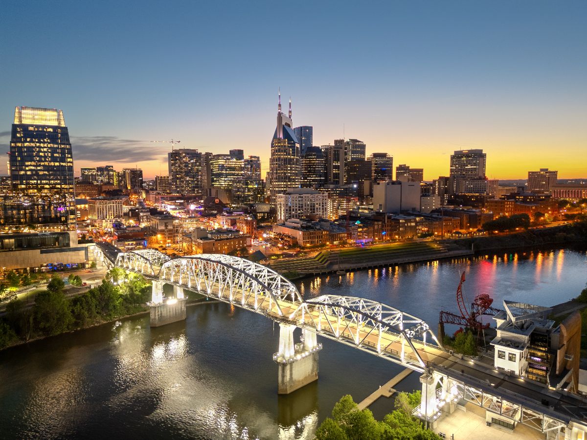 Skyline over the Cumberland River at golden hour.