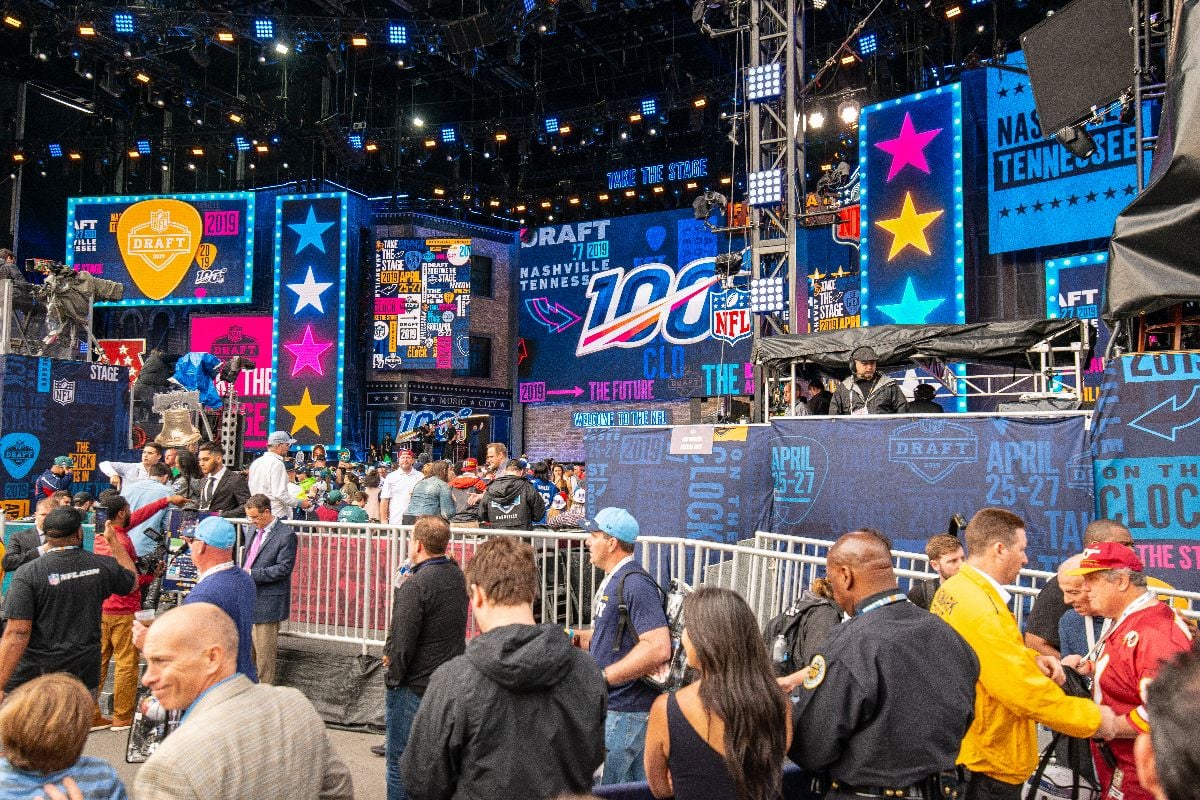 The NFL draft in Nashville showing part of the stage and some of the crowd.