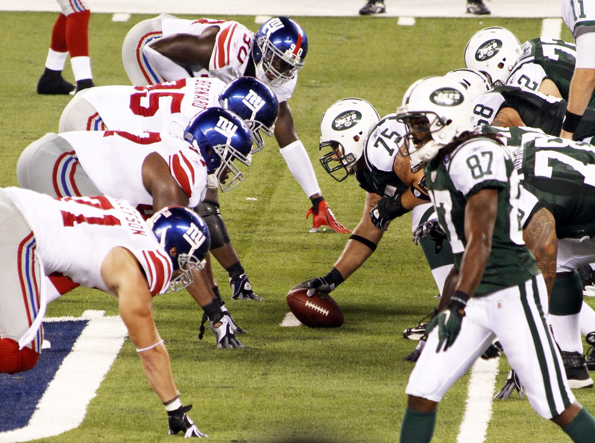 New York Jets players play against the New York Giants at MetLife Stadium.