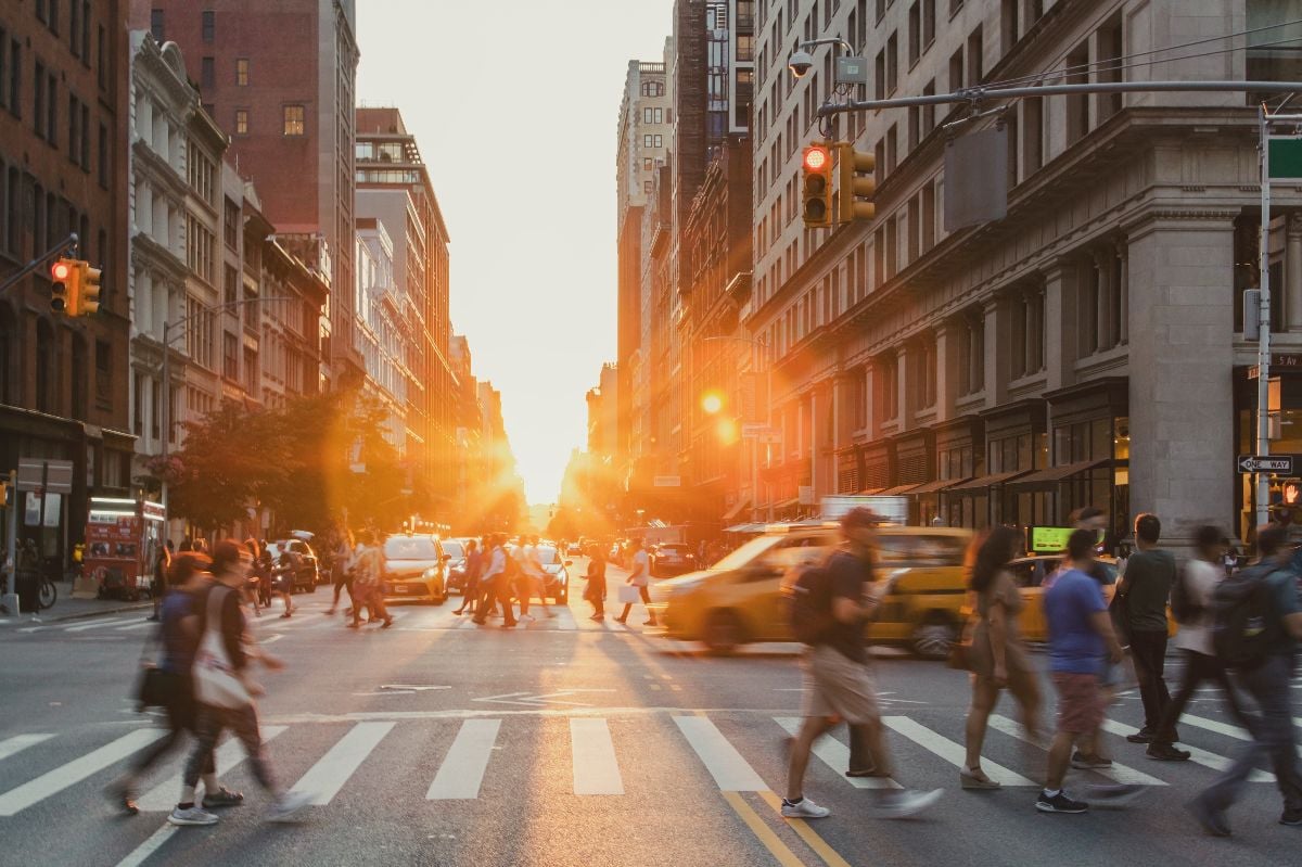 Busy people crossing the NYC crosswalk.