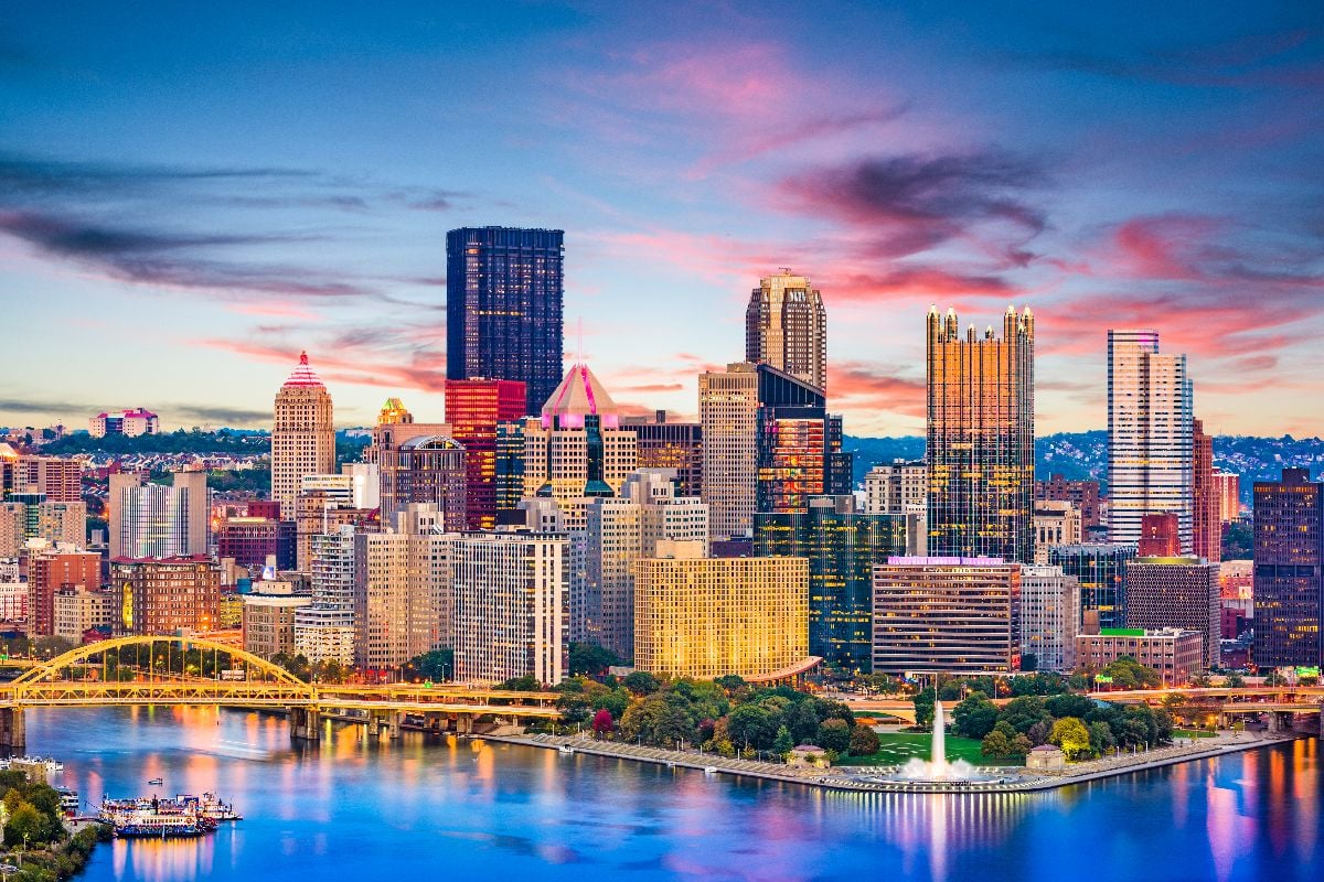 Pittsburgh downtown city skyline on the rivers at dusk.
