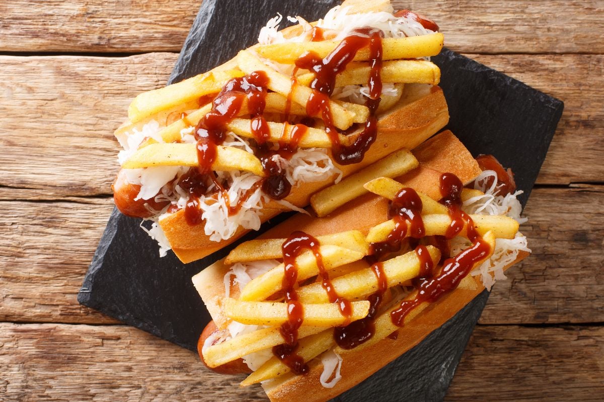 Polish boy with sausage, cabbage, fries and barbecue sauce.