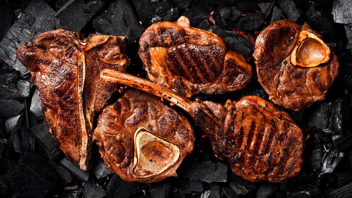 A variety of grilled prime steak on the grill.