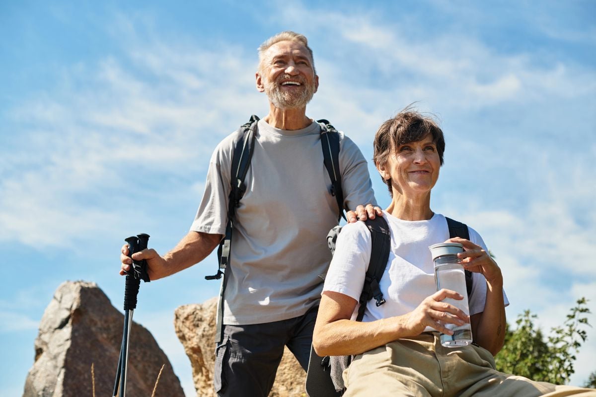 Retirees enjoy hiking in the mountains.