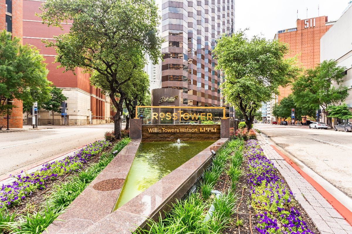 Ross Tower sign in front of buildings in downtown