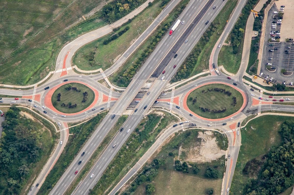 Roundabout intersection on busy highway.