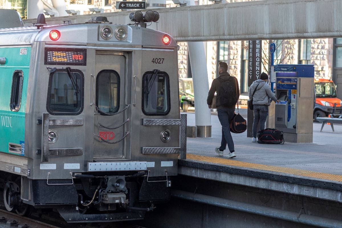 One person boards the A-line light rail, departing from Union Station bound for Denver International Airport.